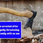 Man arrested after allegedly threatening his family with an axe