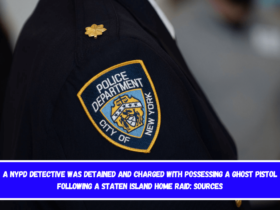 A NYPD detective was detained and charged with possessing a ghost pistol following a Staten Island home raid Sources