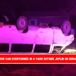 The van overturned in a yard outside Joplin on Zora.