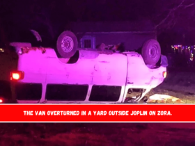 The van overturned in a yard outside Joplin on Zora.